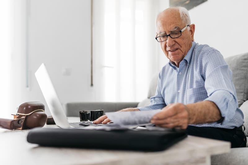 Older gentleman distressed about his taxes.