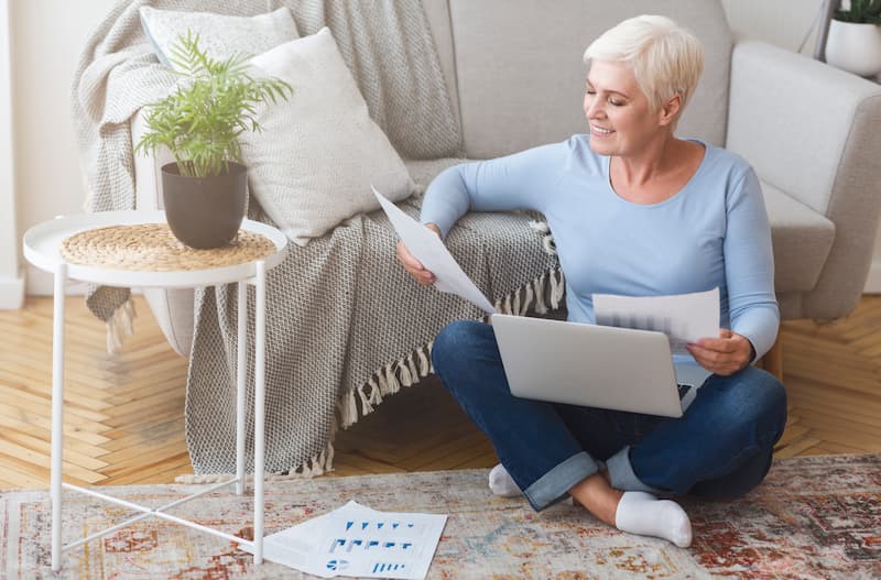 Senior woman looking over alternatives to a reverse mortgage.